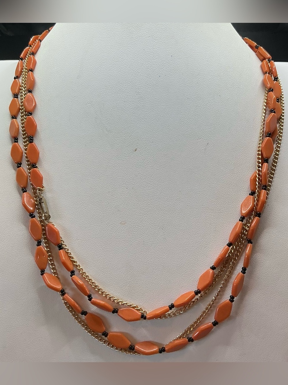 VINTAGE HONG KONG 46” ORANGE BLACK BEAD NECKLACE WITH GOLD TONE CHAIN ACCENT